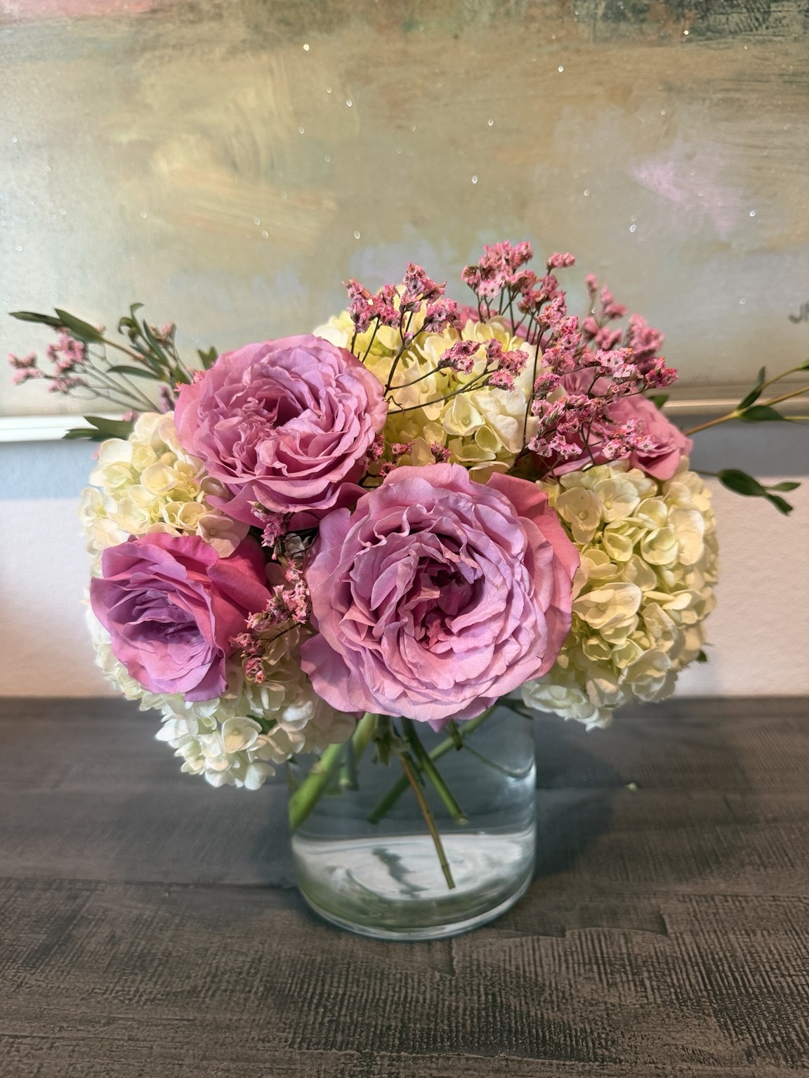 Lilac, pink and cream custom floral arrangement with roses and hydrangea by Petite Petal